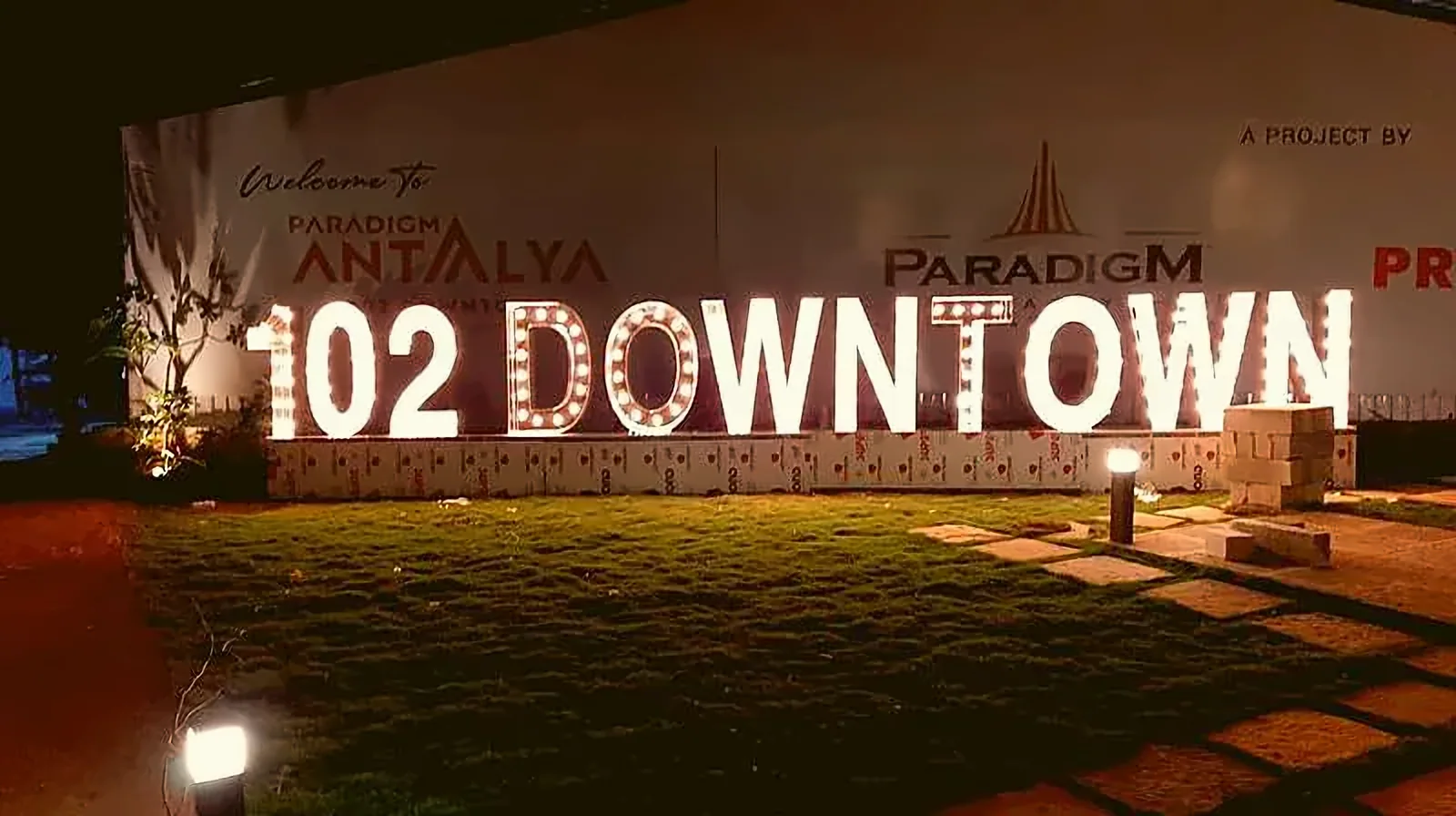 Lit-up signage by Crewnited
